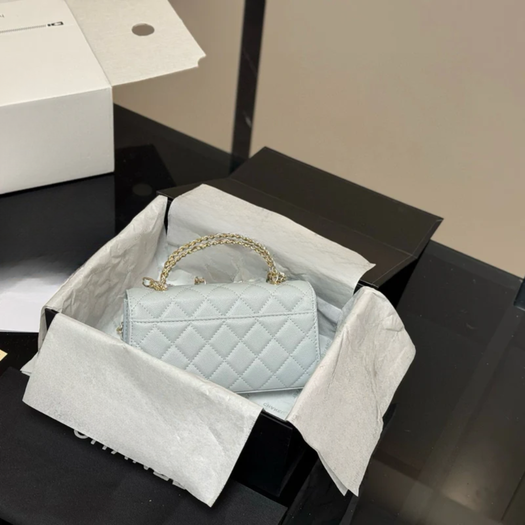 Bolso Classic Flap gris hielo – Chanel 07